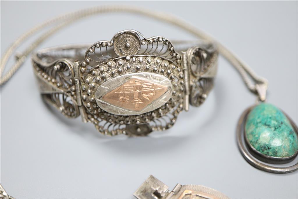 An Egyptianesque two colour white metal bracelet, filligree bracelet, necklaces etc.